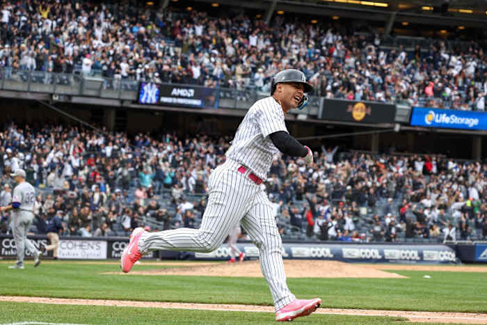 May 8, 2022; Bronx, New York, USA; New York Yankees second baseman Gleyber Torres (25) reacts while running the bases after hitting a walk-off solo home run during the bottom of the ninth inning against the Texas Rangers at Yankee Stadium.